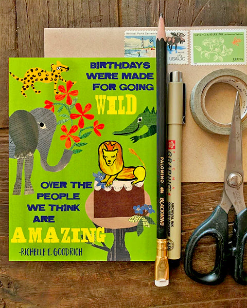 have a wild birthday greeting card on desk with tools. original collage artwork designed by denise fiedler for paste.